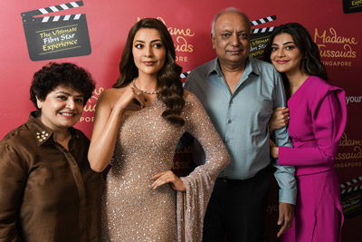 kajal-and-her-family-with-kajal-wax-statue