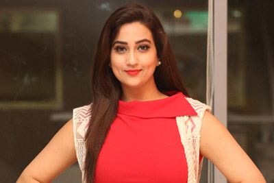 Manjusha Stills at 24 Kisses Movie Pre Release Event