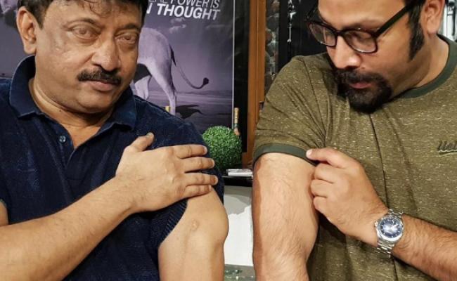 rgv-sandeep-reddy-vanga-show-off-triceps